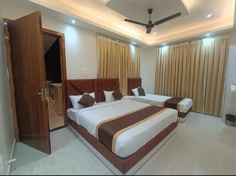 3 Bed Non-AC at Shri Gajanan Maharaj Sansthan - Comfortable room with natural ventilation